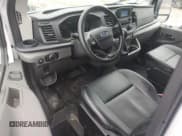 ✅ 2024 Ford Transit Cargo • VIN: 1FTYE1Y84RKA38434 • Lot: 52954035. Listed on Copart with 24,400 mi. Free auction sales archive from the USA and detailed vehicle history report at DreamBid. Image 8.