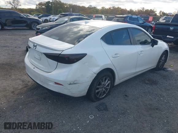 ✅ 2016 Mazda 3 i Touring • VIN: JM1BM1W72G1348510 • Lot: 43522040. Listed on IAAI with 140,008 mi. Free auction sales archive from the USA and detailed vehicle history report at DreamBid. Image 4.