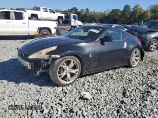 ✅ 2009 Nissan 370Z Touring • VIN: JN1AZ44E69M406347 • Lot: 85711325. Listed on Copart with 123,827 mi. Free auction sales archive from the USA and detailed vehicle history report at DreamBid. Image 1.