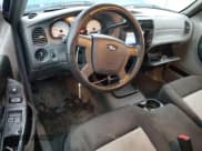 ✅ 2009 Ford Ranger XLT • VIN: 1FTYR44E39PA66567 • Lot: 92318515. Wystawiony na Copart z przebiegiem 93 482 mil. Bezpłatny archiwum sprzedaży aukcyjnych z USA i szczegółowy raport historii pojazdu na DreamBid. Zdjęcie 8.