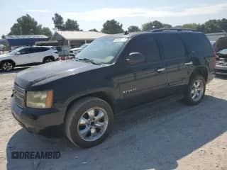 2007 Chevrolet Tahoe LS z VIN 1GNFC13037R428693, wystawiony jako Copart lot #67767765 z przebiegiem 227 479 mil mil oraz Szkoda całkowita • Salvage title. Historia ofert i sprzedaży dostępna na DreamBid. Obrazek 1.