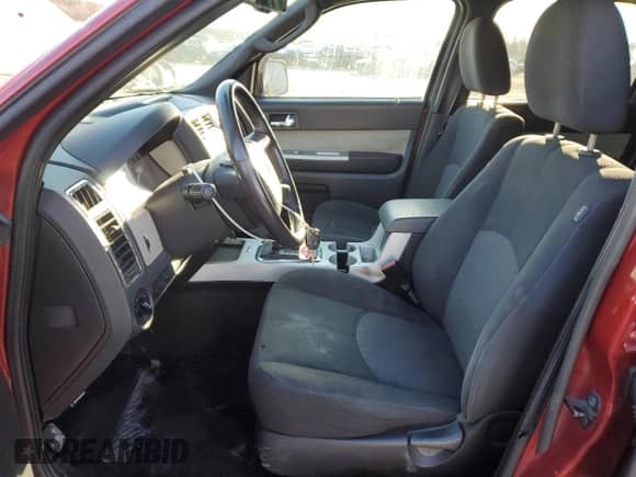 2009 Mercury Mariner with VIN 4M2CU81G09KJ18864, listed as a Copart auction lot 45577125 with Not provided miles and Salvage title. Bid and sale history available at DreamBid. Image 7.