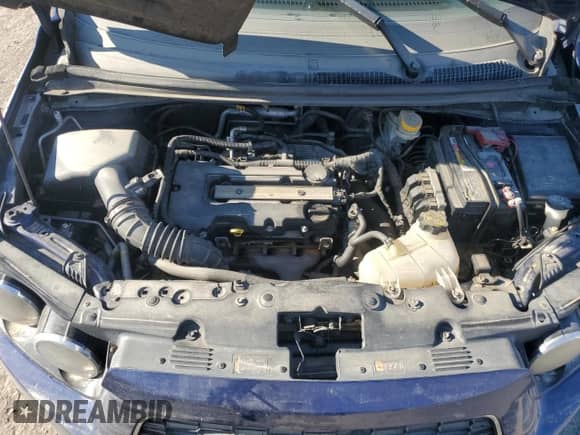 2012 Chevrolet Sonic LTZ z VIN 1G1JE5SB4C4206347, wystawiony jako Copart lot #46341705 z przebiegiem Nie podano mil oraz Szkoda całkowita • Salvage title. Historia ofert i sprzedaży dostępna na DreamBid. Obrazek 11.