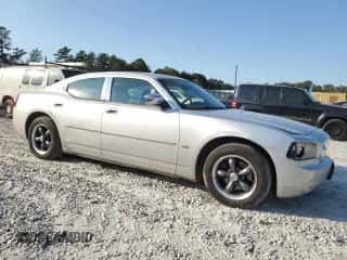 2010 Dodge Charger SXT with VIN 2B3CA3CV9AH242206, listed as a Copart auction lot 76139314 with 263,348 mi miles and Salvage title. Bid and sale history available at DreamBid. Image 4.