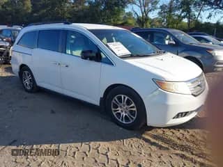 2012 Honda Odyssey EX z VIN 5FNRL5H42CB062606, wystawiony jako IAAI lot #43351915 z przebiegiem 197 498 mil mil oraz . Historia ofert i sprzedaży dostępna na DreamBid. Obrazek 1.