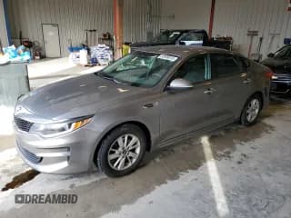 ✅ 2018 Kia Optima LX • VIN: 5XXGT4L39JG196801 • Lot: 82696815. Listed on Copart with 143,087 mi. Free auction sales archive from the USA and detailed vehicle history report at DreamBid. Image 1.