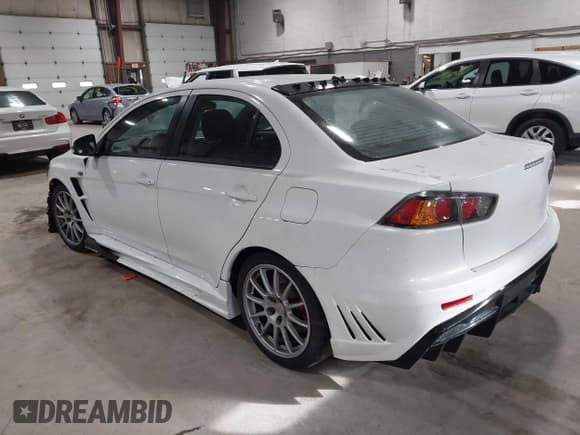 ✅ 2015 Mitsubishi Lancer Evolution GSR • VIN: JA32W8FV4FU016162 • Lot: 43647204. Wystawiony na IAAI z przebiegiem 13 780 mil. Bezpłatny archiwum sprzedaży aukcyjnych z USA i szczegółowy raport historii pojazdu na DreamBid. Zdjęcie 3.