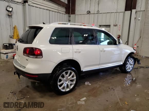 ✅ 2009 Volkswagen Touareg V6 • VIN: WVGFM77L69D035733 • Лот: 89385335. Опубликован ранее на Copart с пробегом 84 557 миль. Бесплатный доступ к архиву аукционных продаж из США и подробный отчёт об истории автомобиля на DreamBid. Изображение 3.