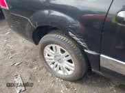 ✅ 2014 Lincoln Navigator • VIN: 5LMJJ3J56EEL04885 • Lot: 42051762. Listed on IAAI with 162,851 mi. Free auction sales archive from the USA and detailed vehicle history report at DreamBid. Image 6.