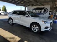 ✅ 2022 Audi Q3 Premium • VIN: WA1AUCF3XN1031523 • Lot: 81161575. Wystawiony na Copart z przebiegiem 75 944 mil. Bezpłatny archiwum sprzedaży aukcyjnych z USA i szczegółowy raport historii pojazdu na DreamBid. Zdjęcie 4.