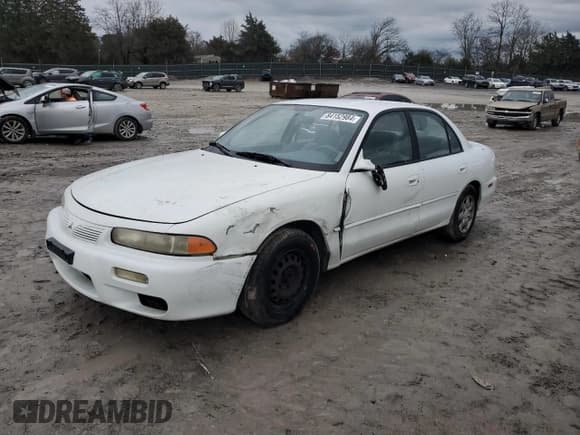 ✅ 1997 Mitsubishi Galant ES • VIN: 4A3AJ56G7VE098390 • Lot: 84152984. Wystawiony na Copart z przebiegiem 177 759 mil. Bezpłatny archiwum sprzedaży aukcyjnych z USA i szczegółowy raport historii pojazdu na DreamBid. Zdjęcie 1.