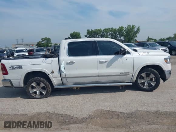 ✅ 2021 Ram 1500 Laramie • VIN: 1C6SRFJT2MN568292 • Lot: 42831621. Listed on IAAI with 81,902 mi. Free auction sales archive from the USA and detailed vehicle history report at DreamBid. Image 13.