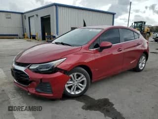✅ 2019 Chevrolet Cruze LT • VIN: 3G1BE6SM9KS601831 • Lot: 56832693. Listed on Copart with 55,257 mi. Free auction sales archive from the USA and detailed vehicle history report at DreamBid. Image 1.