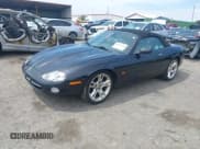 ✅ 2003 Jaguar XK • VIN: SAJDA42C732A35547 • Lot: 42090286. Listed on IAAI with 65,840 mi. Free auction sales archive from the USA and detailed vehicle history report at DreamBid. Image 2.