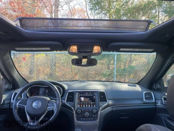 2018 Jeep Grand Cherokee Sterling z VIN 1C4RJFBG8JC162167, wystawiony jako Copart lot #91731335 z przebiegiem 128 078 mil mil oraz Czysty tytuł • Clean title. Historia ofert i sprzedaży dostępna na DreamBid. Obrazek 15.