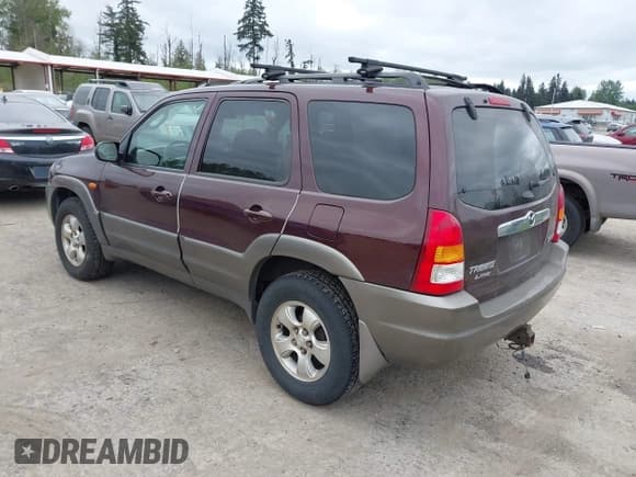 ✅ 2001 Mazda Tribute LX • VIN: 4F2CU08141KM10269 • Лот: 42138704. Опубликован ранее на IAAI с пробегом 166 825 миль. Бесплатный доступ к архиву аукционных продаж из США и подробный отчёт об истории автомобиля на DreamBid. Изображение 3.