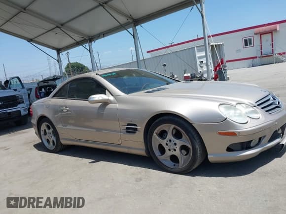 ✅ 2005 Mercedes-Benz SL 500 • VIN: WDBSK75F75F090730 • Lot: 42278730. Listed on IAAI with 83,765 mi. Free auction sales archive from the USA and detailed vehicle history report at DreamBid. Image 14.