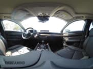 ✅ 2025 Mazda CX-50 S Premium Plus • VIN: 7MMVABEMXSN321379 • Лот: 42897243. Опубликован ранее на IAAI с пробегом 3 694 миль. Бесплатный доступ к архиву аукционных продаж из США и подробный отчёт об истории автомобиля на DreamBid. Изображение 18.