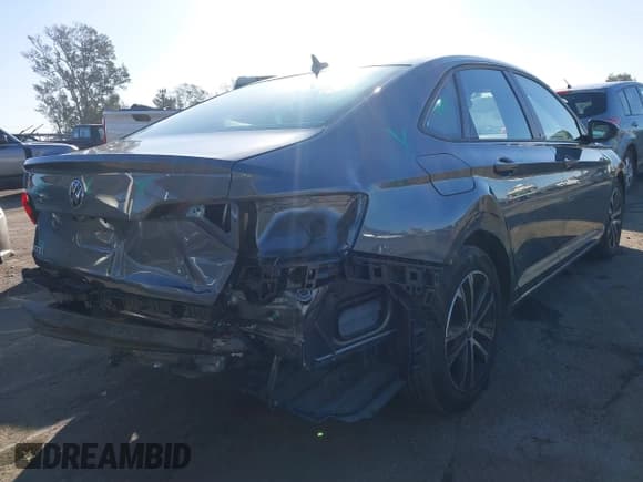 ✅ 2023 Volkswagen Jetta Sport • VIN: 3VWAM7BU3PM013069 • Lot: 41355296. Listed on IAAI with 21,168 mi. Free auction sales archive from the USA and detailed vehicle history report at DreamBid. Image 4.