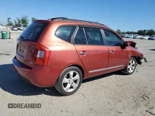 ✅ 2008 Kia Rondo LX • VIN: KNAFG525487209835 • Лот: 76913274. Опубликован ранее на Copart с пробегом 148 341 миль. Бесплатный доступ к архиву аукционных продаж из США и подробный отчёт об истории автомобиля на DreamBid. Изображение 3.