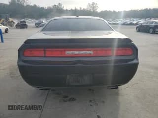 ✅ 2013 Dodge Challenger SXT • VIN: 2C3CDYAG0DH604374 • Lot: 83001064. Wystawiony na Copart z przebiegiem 173 120 mil. Bezpłatny archiwum sprzedaży aukcyjnych z USA i szczegółowy raport historii pojazdu na DreamBid. Zdjęcie 6.