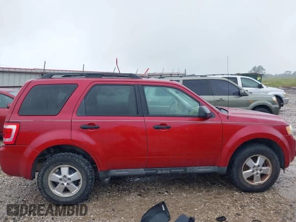 ✅ 2011 Ford Escape XLT • VIN: 1FMCU9D7XBKB32540 • Lot: 42327433. Listed on IAAI with 73,075 mi. Free auction sales archive from the USA and detailed vehicle history report at DreamBid. Image 13.