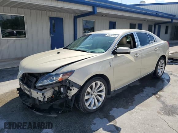 ✅ 2014 Lincoln MKS • VIN: 1LNHL9DK7EG601507 • Lot: 89434975. Listed on Copart with 42,718 mi. Free auction sales archive from the USA and detailed vehicle history report at DreamBid. Image 1.