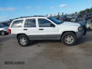 ✅ 2004 Jeep Grand Cherokee Laredo • VIN: 1J4GW48NX4C407942 • Лот: 43629318. Опубликован ранее на IAAI с пробегом 164 889 миль. Бесплатный доступ к архиву аукционных продаж из США и подробный отчёт об истории автомобиля на DreamBid. Изображение 13.
