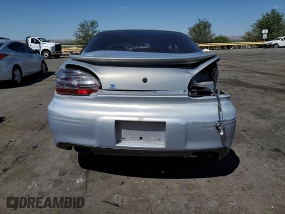 ✅ 1999 Pontiac Grand Prix GTP • VIN: 1G2WR5212XF242366 • Lot: 70438744. Wystawiony na Copart z przebiegiem 181 645 mil. Bezpłatny archiwum sprzedaży aukcyjnych z USA i szczegółowy raport historii pojazdu na DreamBid. Zdjęcie 6.