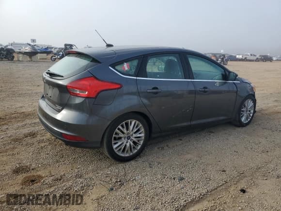 ✅ 2016 Ford Focus Titanium • VIN: 1FADP3N20GL249535 • Лот: 93452785. Опубликован ранее на Copart с пробегом 57 259 миль. Бесплатный доступ к архиву аукционных продаж из США и подробный отчёт об истории автомобиля на DreamBid. Изображение 3.