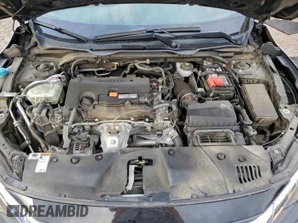 ✅ 2018 Honda Civic LX • VIN: 19XFC2F51JE041102 • Lot: 94105785. Wystawiony na Copart z przebiegiem 83 516 mil. Bezpłatny archiwum sprzedaży aukcyjnych z USA i szczegółowy raport historii pojazdu na DreamBid. Zdjęcie 11.