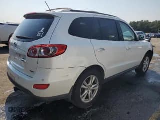 ✅ 2012 Hyundai Santa Fe Limited • VIN: 5XYZK3AB6CG091910 • Lot: 76039224. Listed on Copart with 152,588 mi. Free auction sales archive from the USA and detailed vehicle history report at DreamBid. Image 3.