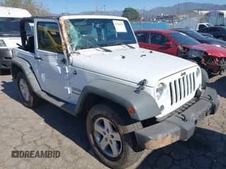 ✅ 2015 Jeep Wrangler Willys Wheeler • VIN: 1C4AJWAG1FL636417 • Lot: 43704796. Listed on IAAI with 81,914 mi. Free auction sales archive from the USA and detailed vehicle history report at DreamBid. Image 1.