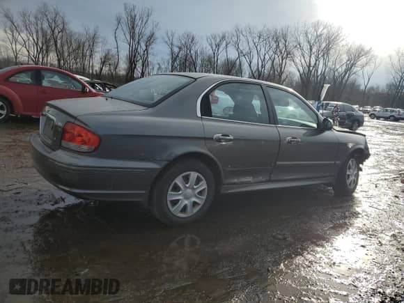 2002 Hyundai Sonata с VIN KMHWF25H52A617339, выставлен на аукционе Copart как лот 46359015 с пробегом 135 828 миль миль и Списание • Salvage title. История ставок и продаж доступна на DreamBid. Изображение 3.