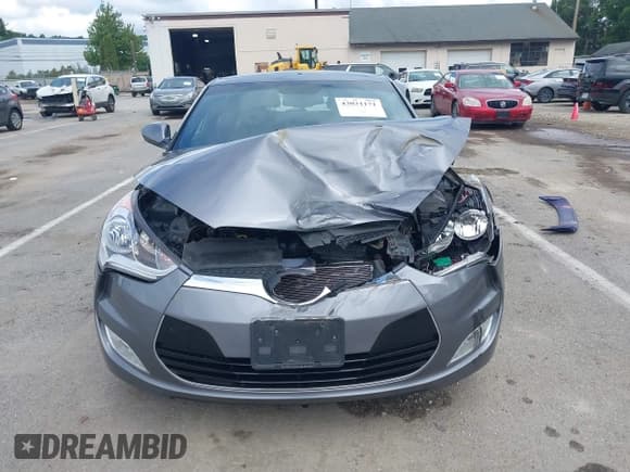 ✅ 2016 Hyundai Veloster • VIN: KMHTC6AD1GU248362 • Lot: 43031171. Listed on IAAI with 51,650 mi. Free auction sales archive from the USA and detailed vehicle history report at DreamBid. Image 12.