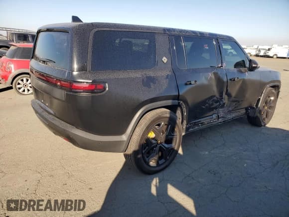 ✅ 2022 Rivian R1S Launch Edition • VIN: 7PDSGABL0NN001489 • Лот: 78808374. Опубликован ранее на Copart с пробегом 25 768 миль. Бесплатный доступ к архиву аукционных продаж из США и подробный отчёт об истории автомобиля на DreamBid. Изображение 3.