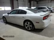 ✅ 2013 Dodge Charger SXT • VIN: 2C3CDXHGXDH546712 • Lot: 81340984. Listed on Copart with 155,146 mi. Free auction sales archive from the USA and detailed vehicle history report at DreamBid. Image 2.