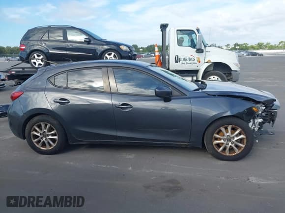 ✅ 2015 Mazda 3 i Sport • VIN: 3MZBM1K71FM189323 • Лот: 43239936. Опубликован ранее на IAAI с пробегом 165 571 миль. Бесплатный доступ к архиву аукционных продаж из США и подробный отчёт об истории автомобиля на DreamBid. Изображение 13.