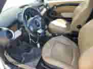 2009 MINI Hardtop with VIN WMWMF33539TT69081, listed as a Copart auction lot 58087205 with 106,470 mi miles and Salvage title. Bid and sale history available at DreamBid. Image 7.