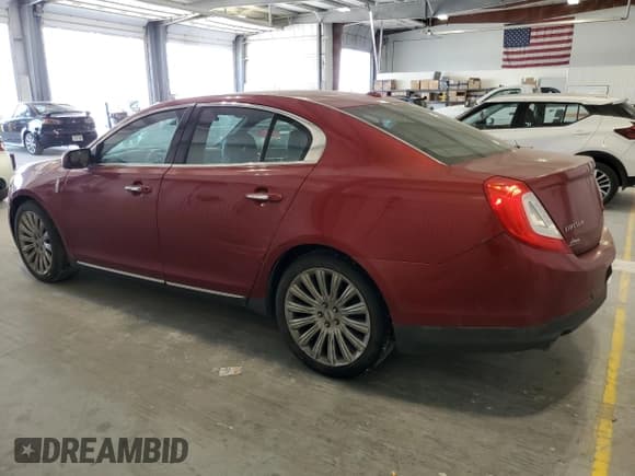 ✅ 2013 Lincoln MKS • VIN: 1LNHL9EK8DG607751 • Лот: 81952965. Опубликован ранее на Copart с пробегом 110 146 миль. Бесплатный доступ к архиву аукционных продаж из США и подробный отчёт об истории автомобиля на DreamBid. Изображение 2.