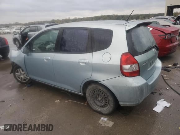 ✅ 2007 Honda Fit • VIN: JHMGD38437S061917 • Lot: 90583195. Listed on Copart with 273,308 mi. Free auction sales archive from the USA and detailed vehicle history report at DreamBid. Image 2.