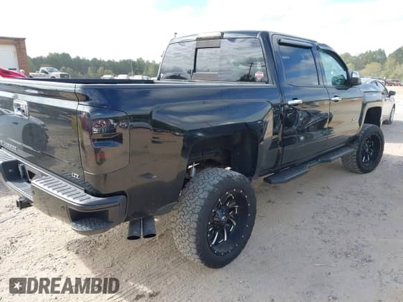 2015 Chevrolet Silverado 1500 LTZ with VIN 3GCUKSEC0FG390127, listed as a IAAI auction lot 43389295 with 120,442 mi miles and . Bid and sale history available at DreamBid. Image 4.