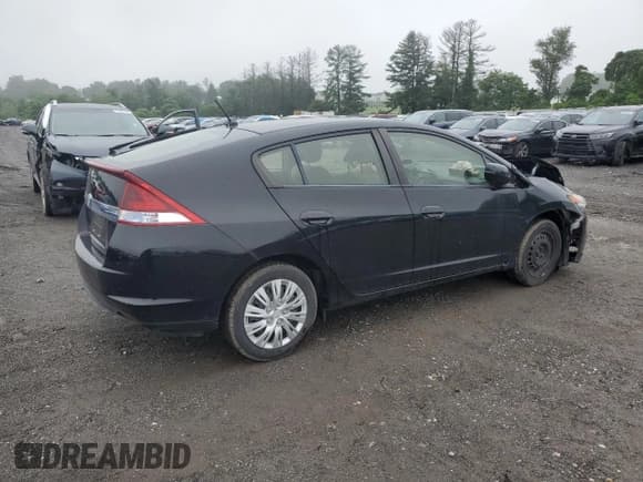 ✅ 2014 Honda Insight LX • VIN: JHMZE2H58ES002321 • Lot: 60122345. Wystawiony na Copart z przebiegiem 85 043 mil. Bezpłatny archiwum sprzedaży aukcyjnych z USA i szczegółowy raport historii pojazdu na DreamBid. Zdjęcie 3.