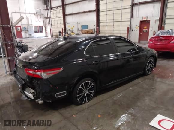 2019 Toyota Camry LE with VIN JTNB11HK0K3080138, listed as a IAAI auction lot 43236866 with 98,032 mi miles and . Bid and sale history available at DreamBid. Image 4.
