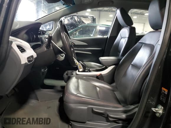✅ 2018 Chevrolet Bolt EV Premier • VIN: 1G1FX6S04J4108808 • Lot: 82117425. Listed on Copart with 54,651 mi. Free auction sales archive from the USA and detailed vehicle history report at DreamBid. Image 7.