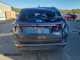 2023 Hyundai Tucson SEL z VIN KM8JBCAE7PU199654, wystawiony jako Copart lot #85779065 z przebiegiem 86 085 mil mil oraz Szkoda całkowita • Salvage title. Historia ofert i sprzedaży dostępna na DreamBid. Obrazek 6.