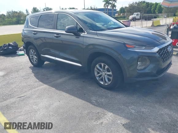 ✅ 2019 Hyundai Santa Fe SE • VIN: 5NMS23AD1KH044131 • Lot: 43237640. Wystawiony na IAAI z przebiegiem 105 619 mil. Bezpłatny archiwum sprzedaży aukcyjnych z USA i szczegółowy raport historii pojazdu na DreamBid. Zdjęcie 1.