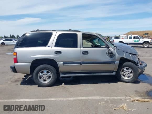2001 Chevrolet Tahoe LT z VIN 1GNEK13T81R122136, wystawiony jako IAAI lot #42272857 z przebiegiem 216 060 mil mil oraz . Historia ofert i sprzedaży dostępna na DreamBid. Obrazek 14.