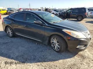 ✅ 2012 Hyundai Azera • VIN: KMHFH4JG0CA161867 • Лот: 86928654. Опубликован ранее на Copart с пробегом 243 946 миль. Бесплатный доступ к архиву аукционных продаж из США и подробный отчёт об истории автомобиля на DreamBid. Изображение 4.