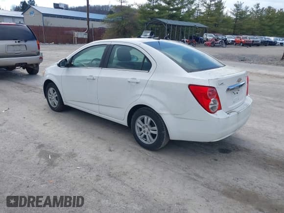 ✅ 2014 Chevrolet Sonic LT • VIN: 1G1JC5SH2E4218784 • Lot: 43681550. Listed on IAAI with 104,015 mi. Free auction sales archive from the USA and detailed vehicle history report at DreamBid. Image 3.